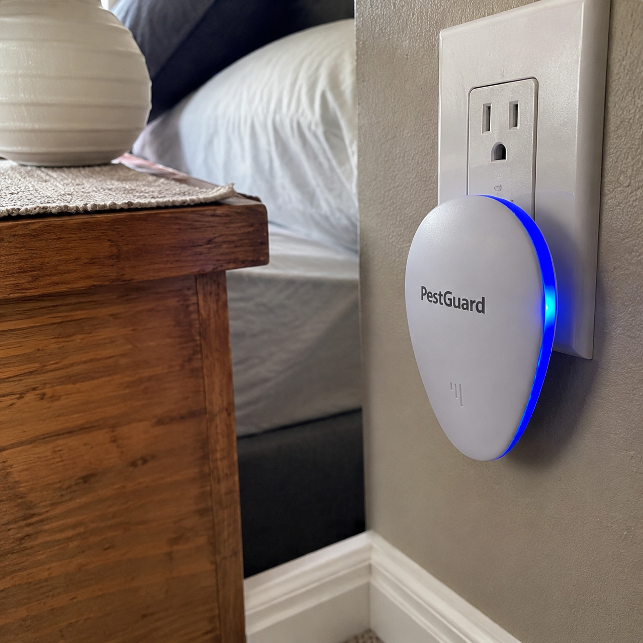 PestGuard device plugged into a wall outlet